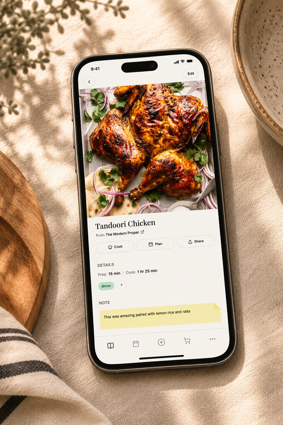 A phone showing a saved recipe in Belly with cook, plan, and share buttons